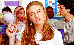 A gif of Cher from Clueless thinking