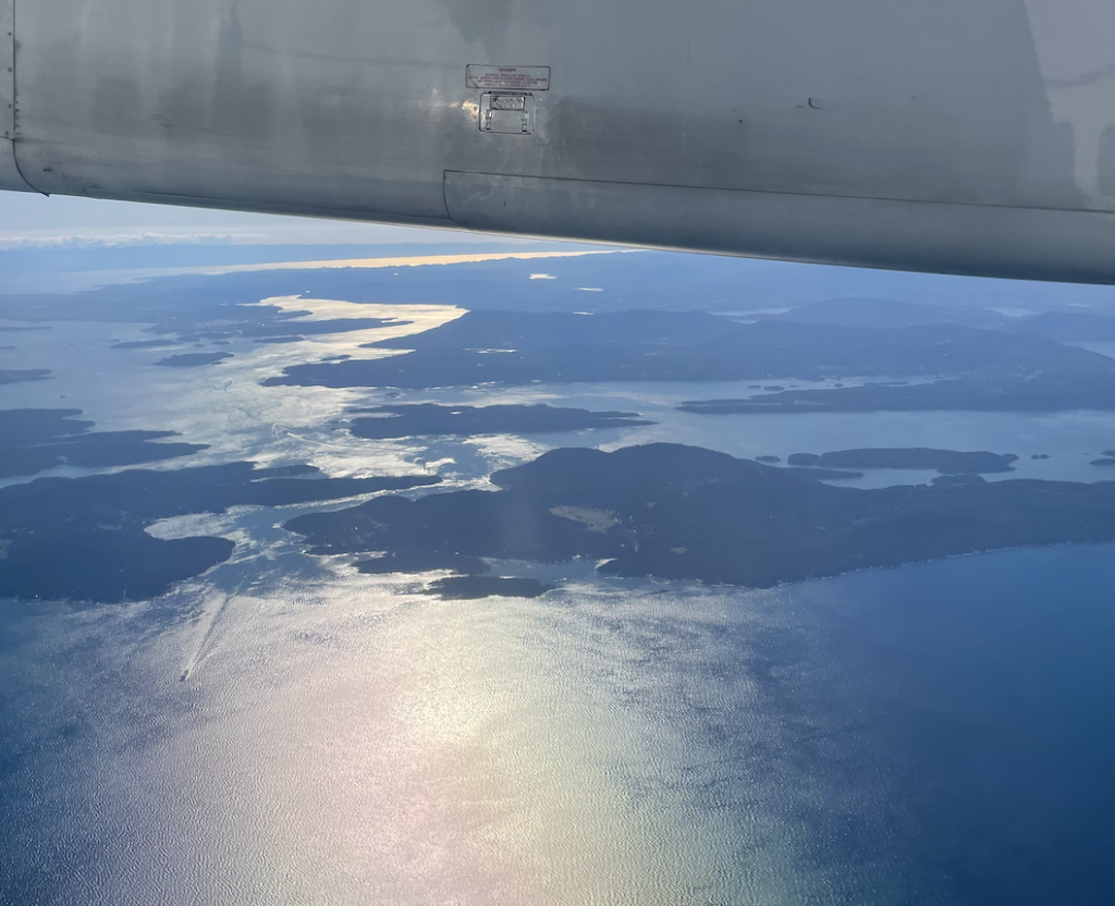 a lake view from the window of a plane