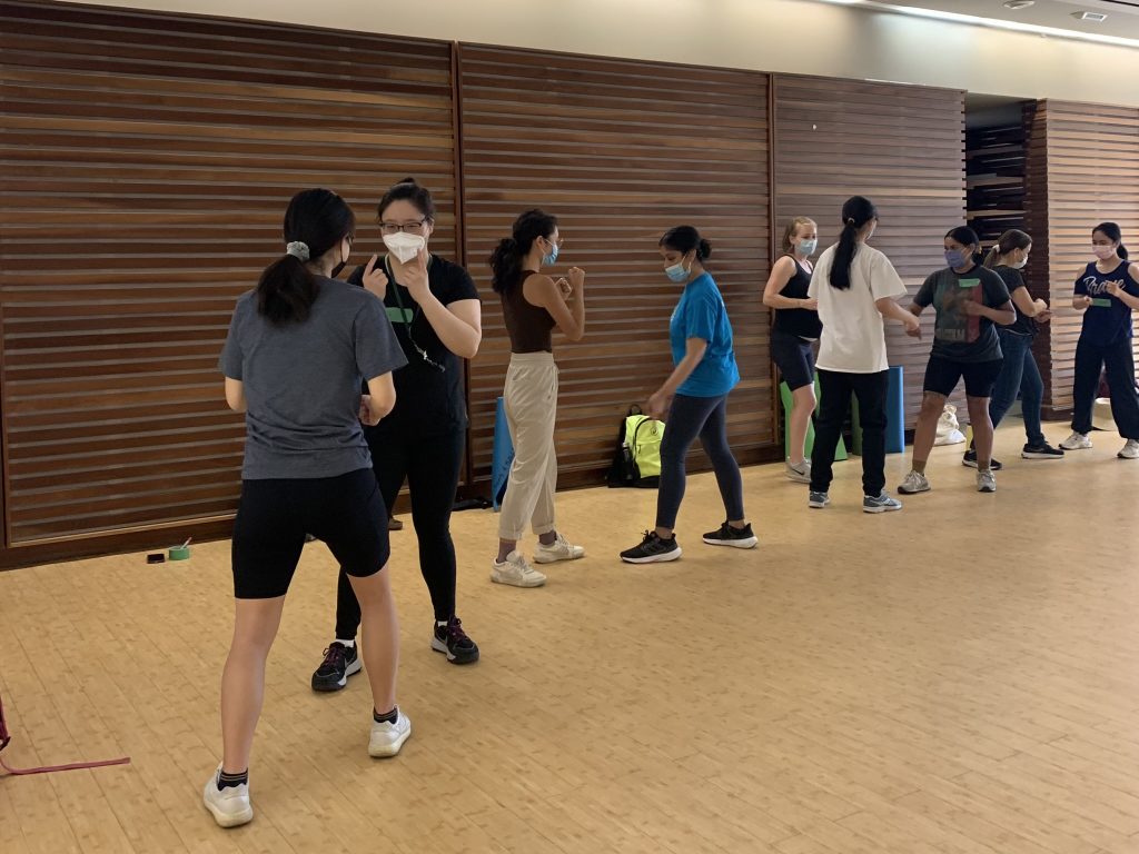Participants in a fighting stance at the Wen Do class.