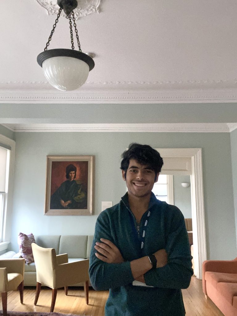 Photo of Yashvit smiling in a room