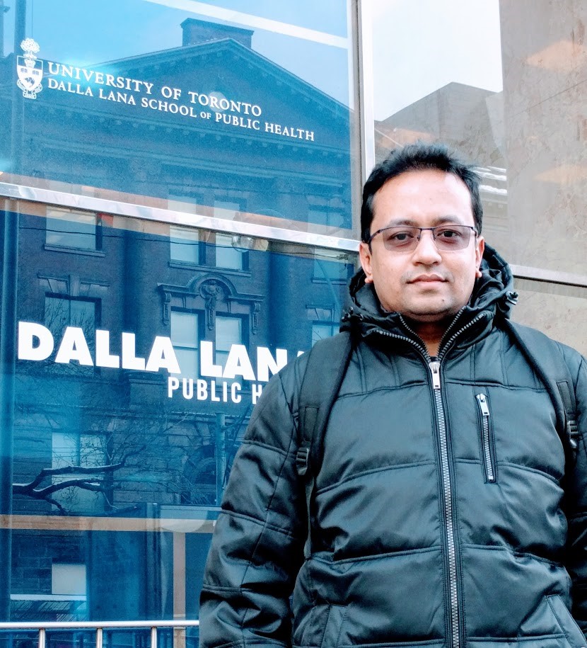Shamim standing front of UofT's Dalla Lana School of Public Health for the first time. 
