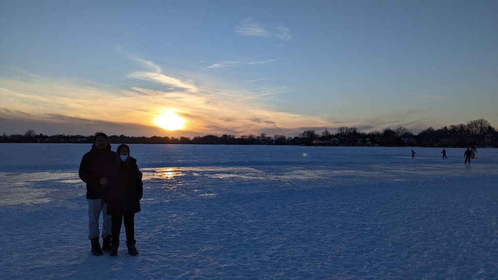 Shamim and his family, looking over a beautiful snowy sunset. 