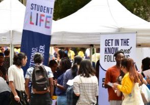 Students visiting Student Life booth at Club's Fair
