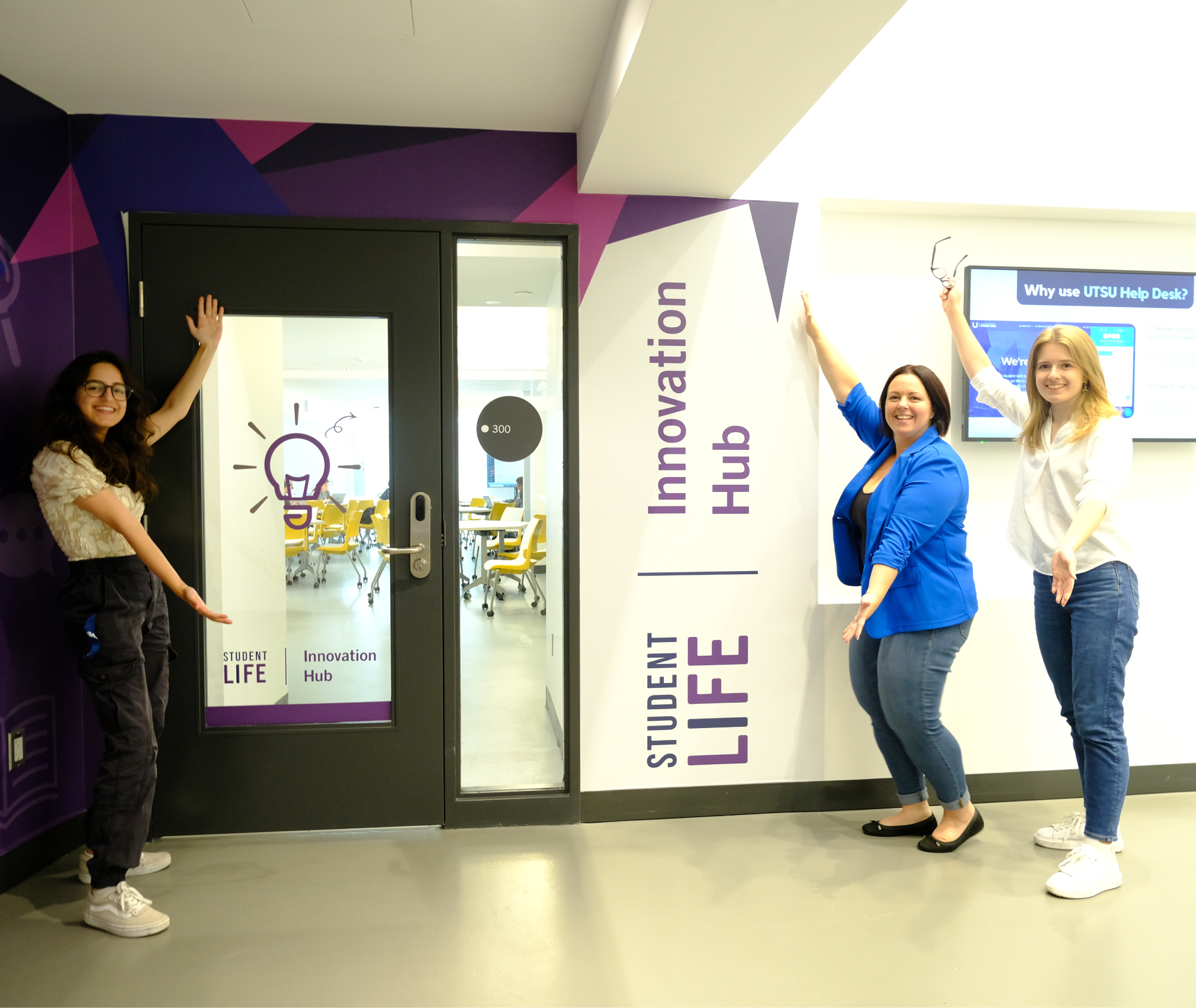 Innovation Hub entrance, with Leadership team members in front