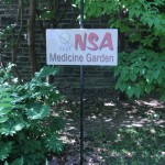 A sign for the Native Students' Association medicine garden