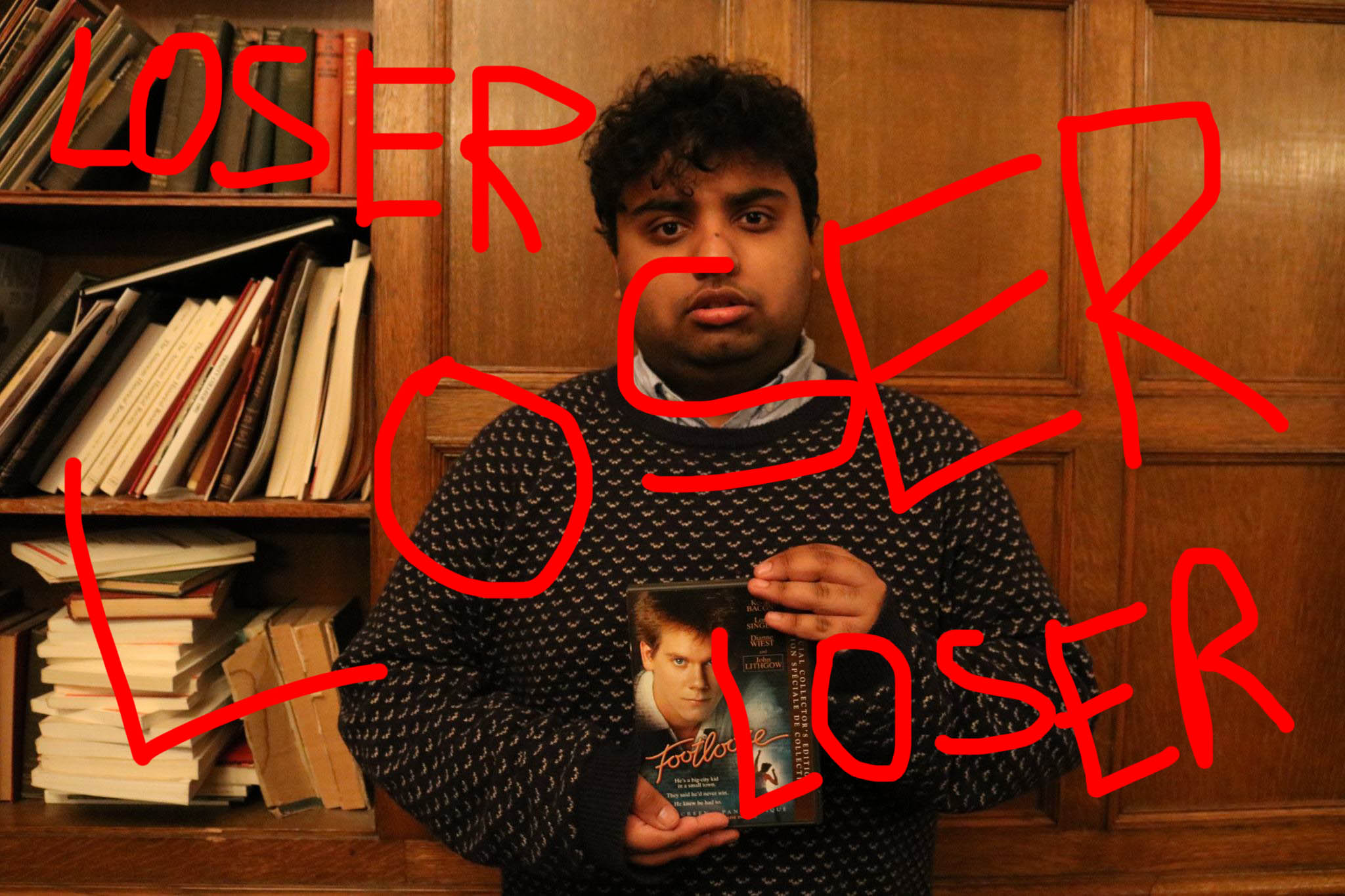 Photo of Avneet with the words "LOSER" written over him.