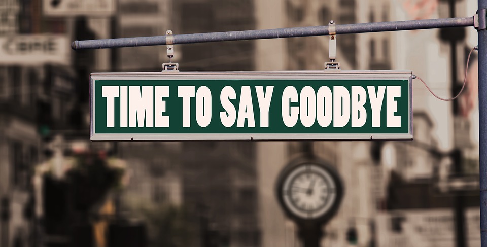 A sign with 'time to say goodbye' on it