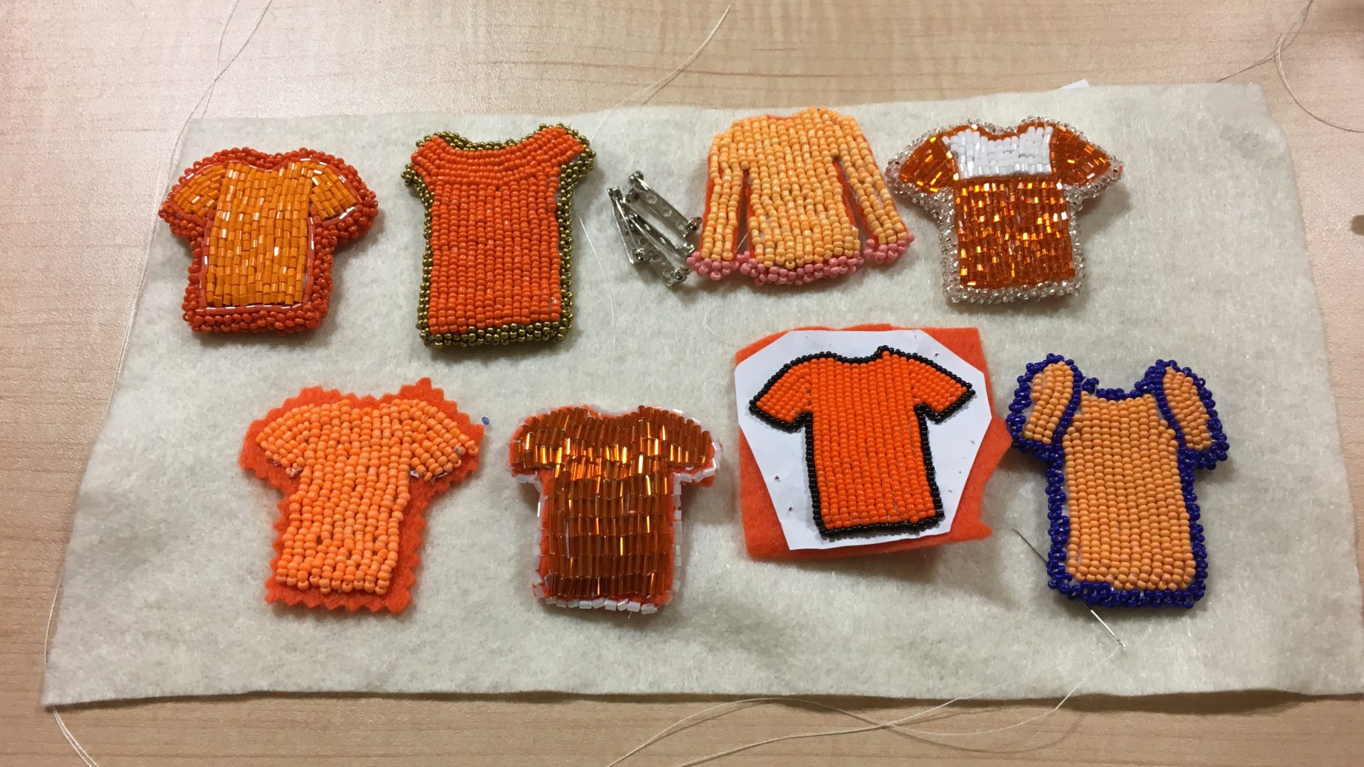 Jenny Blackbird's collection of orange shirt beadings