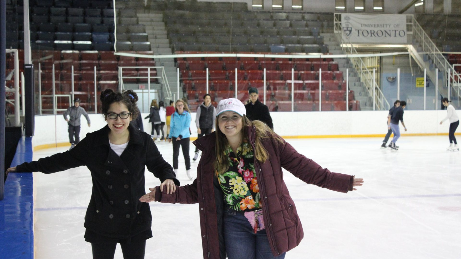 Me holding onto my friend on the ice rink
