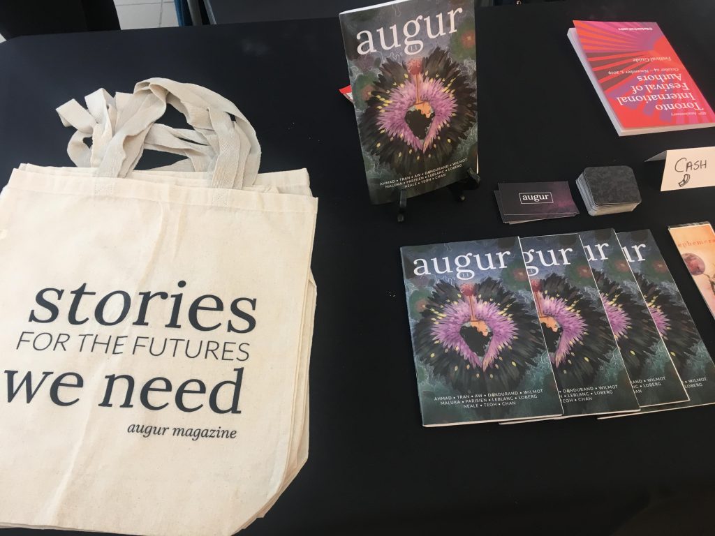 Picture of tote bags and magazines at TIFA (Toronto International Festival of Authors)