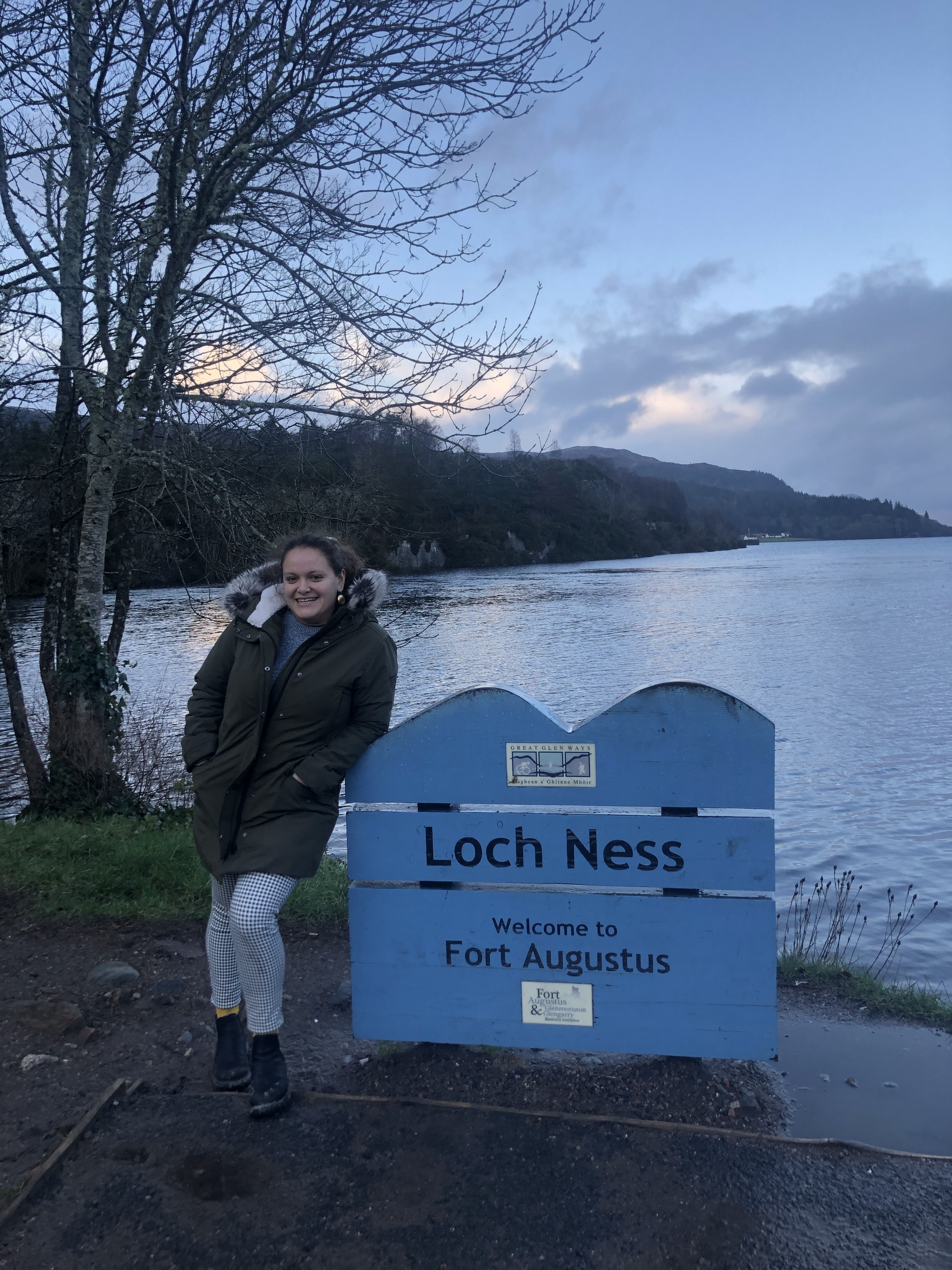 Francesca smiling in front of Loch Ness.