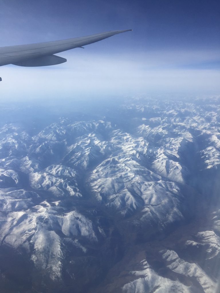 A picture of mountains from a plane